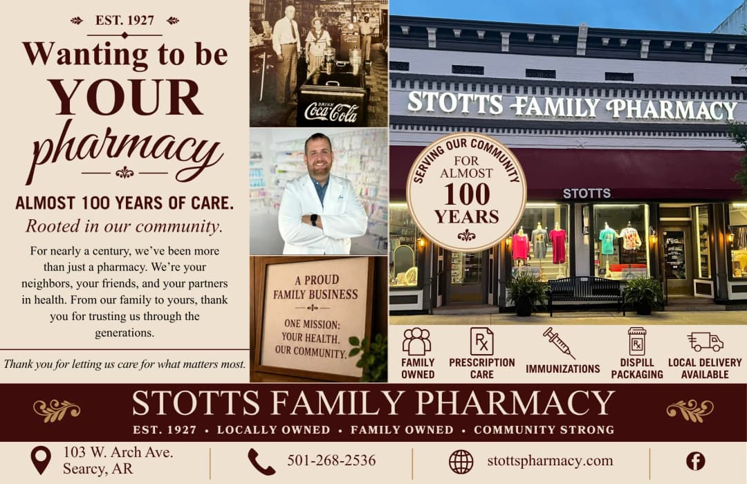 pharmacist greeting a patient inside Stotts Family Pharmacy